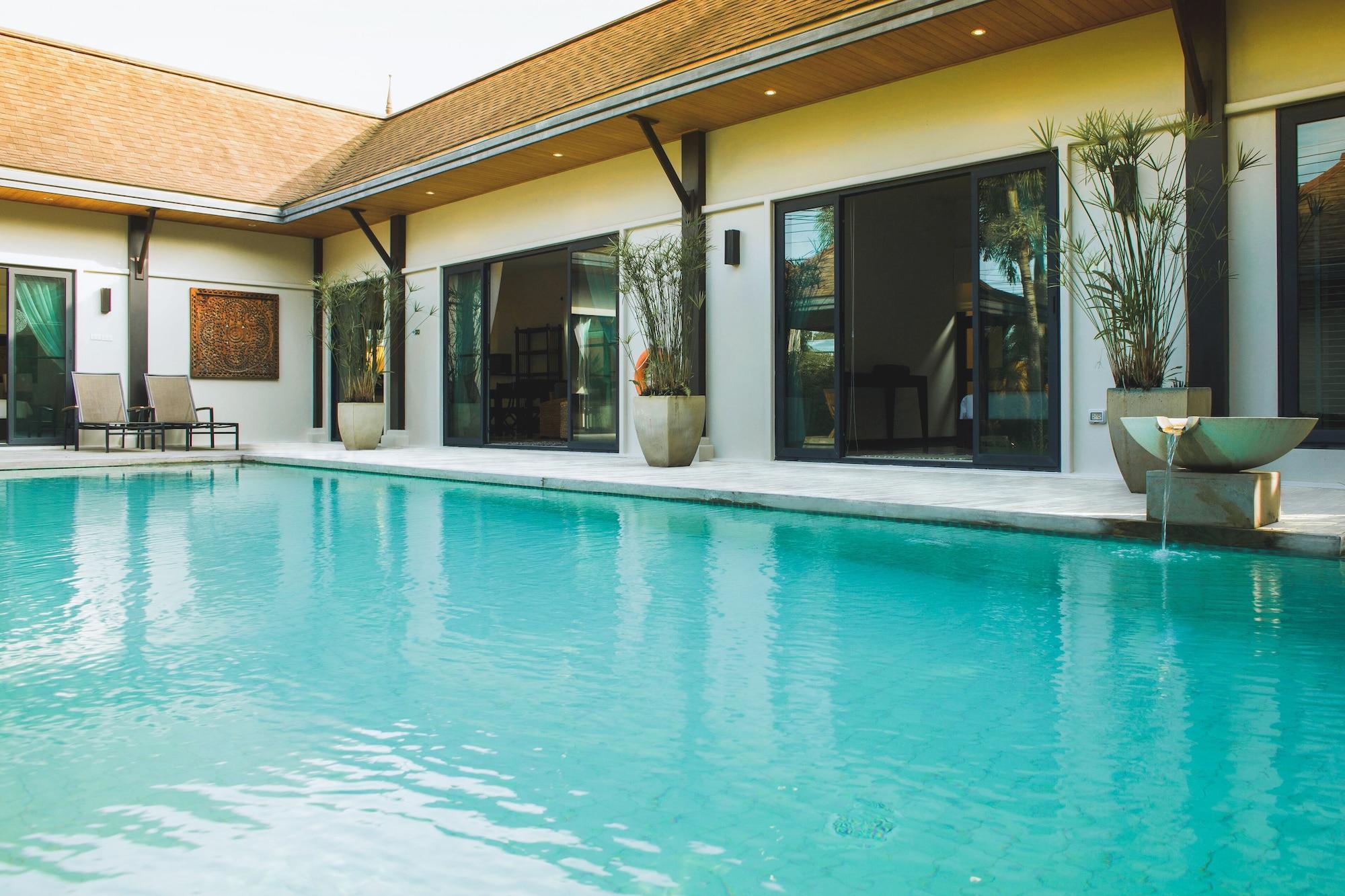 Two Villas Holiday Oriental Style Layan Beach Phuket Bagian luar foto