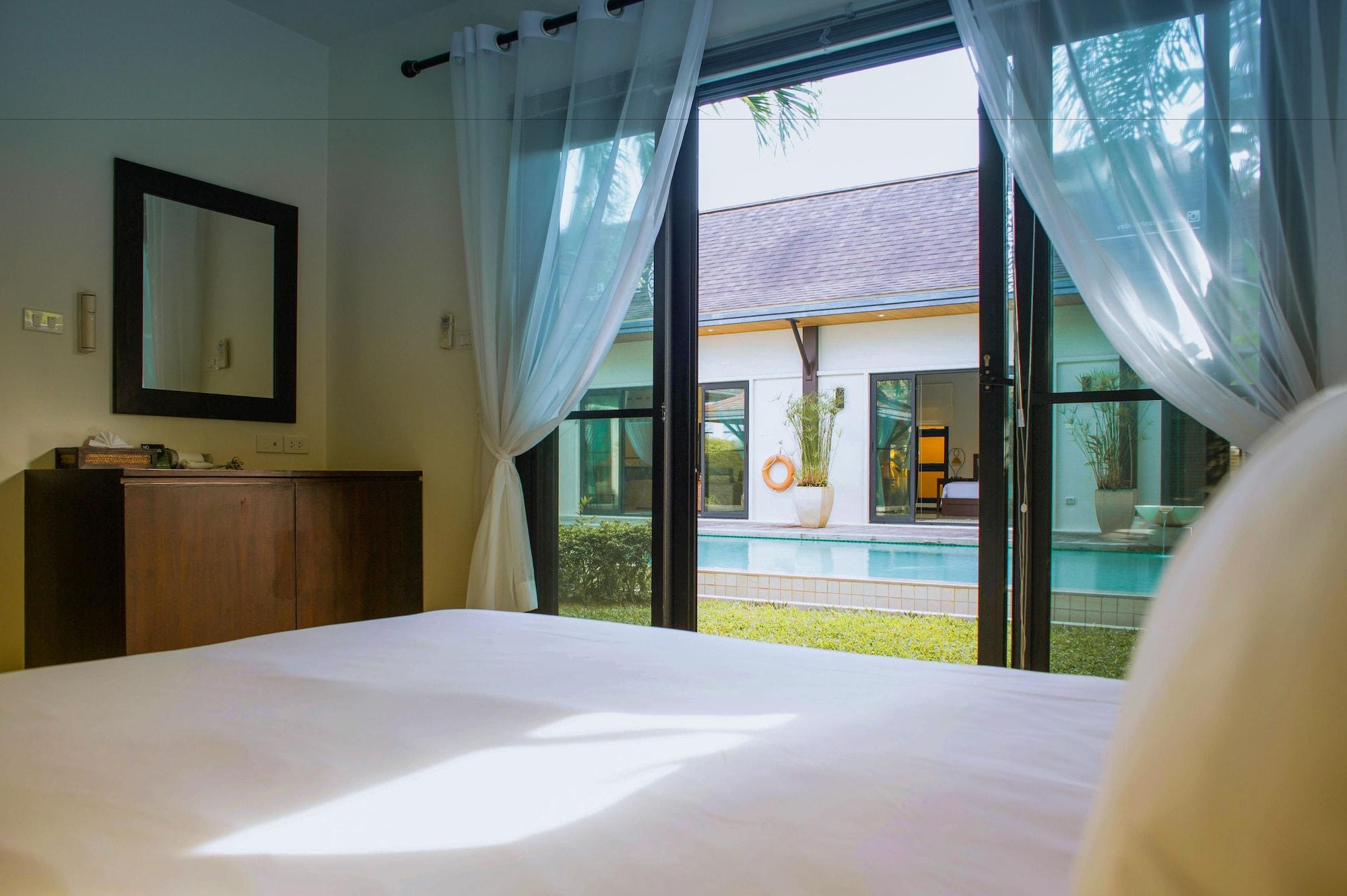 Two Villas Holiday Oriental Style Layan Beach Phuket Bagian luar foto